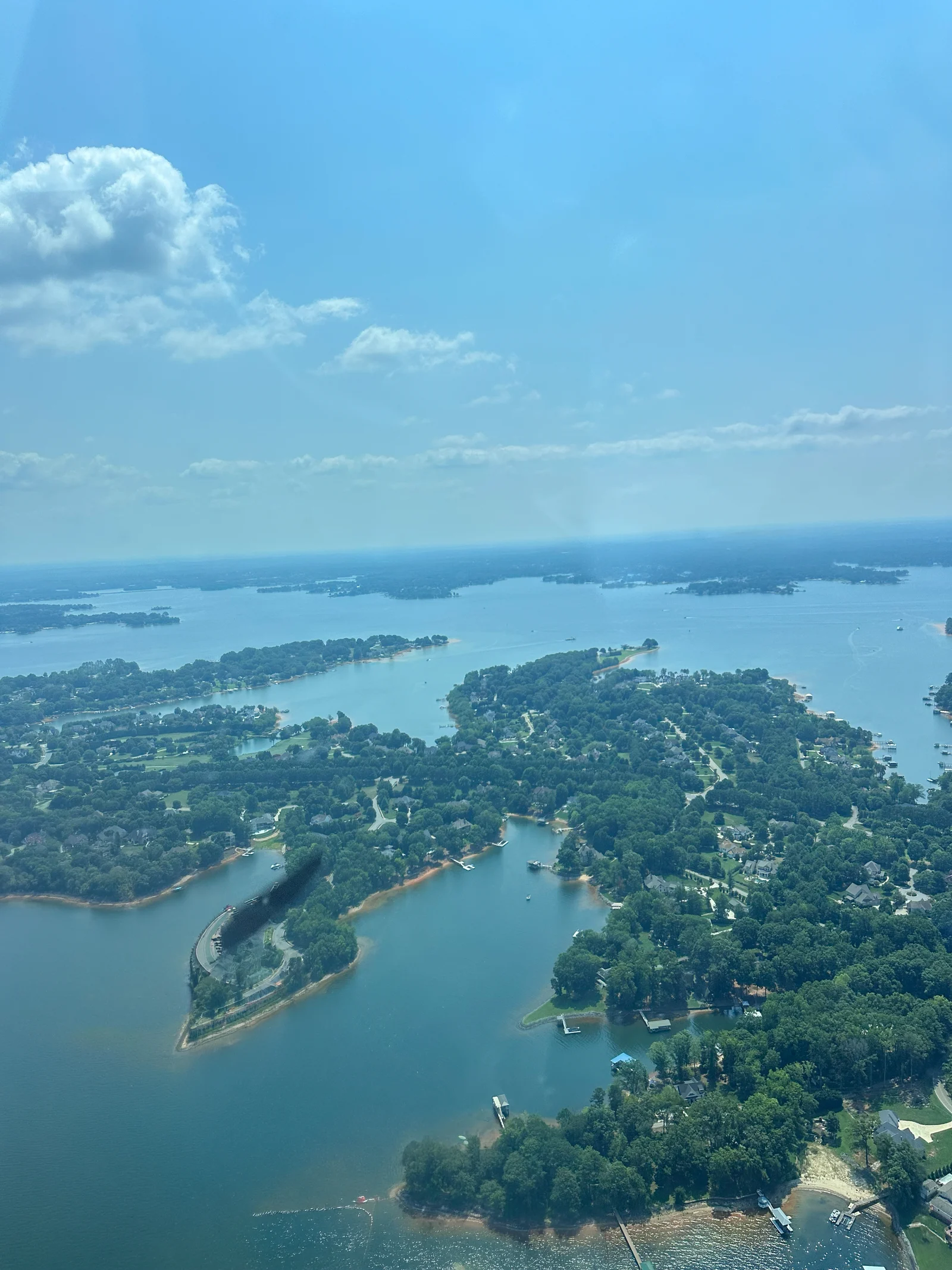 In-flight photograph of winding shoreline and lake islands